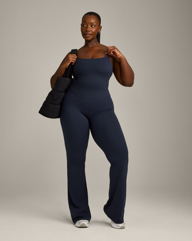 SoftMotion™ Strappy Mid Vest with Built in Bra Shelf with Grey Logo | True Blue