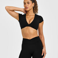 Unified Twist Front Short Sleeve Crop Top White Logo | Black