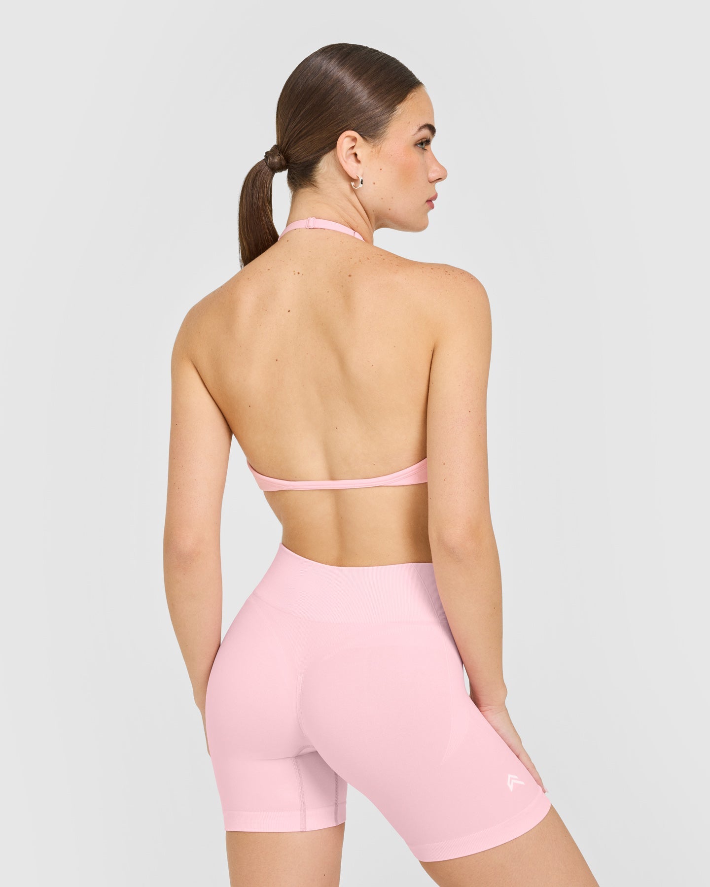 EnhanceLift™ Seamless Minimal Halter Neck Bralette with White Logo | Cherry Blossom Pink