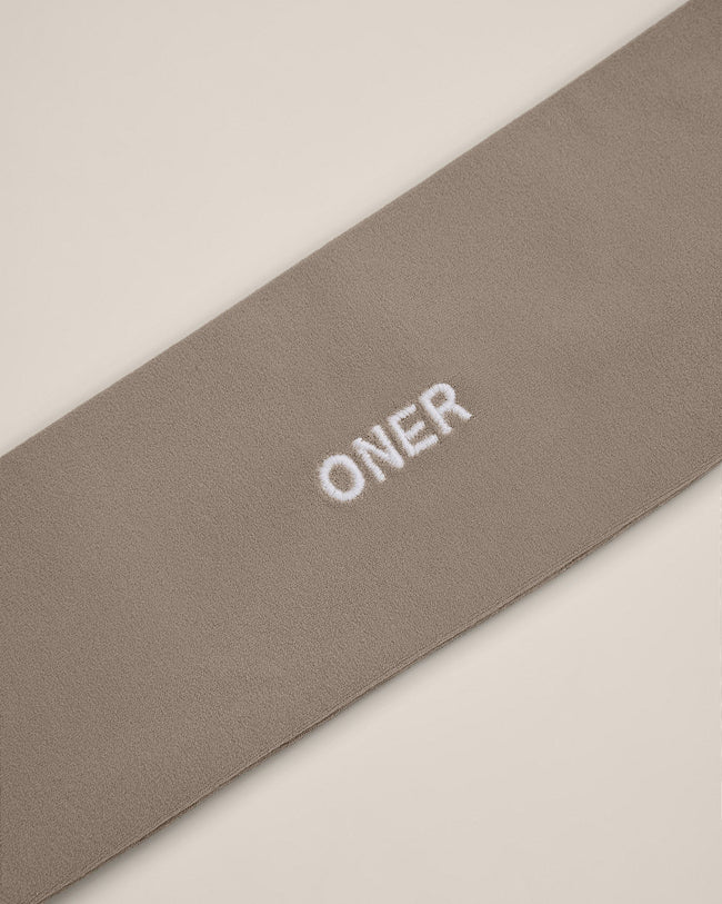 SoftMotion™ Headband with White Logo | Warm Sand