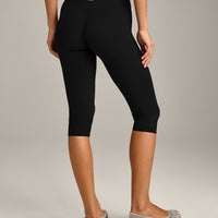 SoftMotion™ High Waisted Capri Leggings with Grey Logo | Black