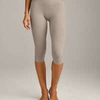 SoftMotion™ High Waisted Capri Leggings with White Logo | Warm Sand