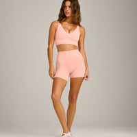 SoftMotion™ Longline Sports Bra with Grey Logo | Peach Orange