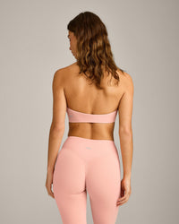 SoftMotion™ Minimal Halter Neck Bralette with Grey Logo | Peach Orange