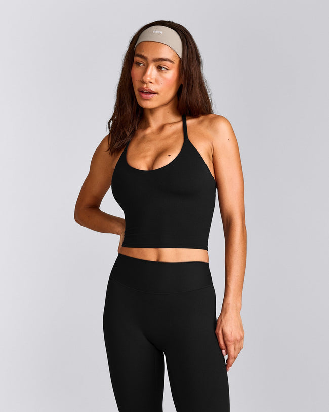 SoftMotion™ Strappy Halter Neck Mid Tank Top with Built in Bra Shelf with Grey Logo | Black