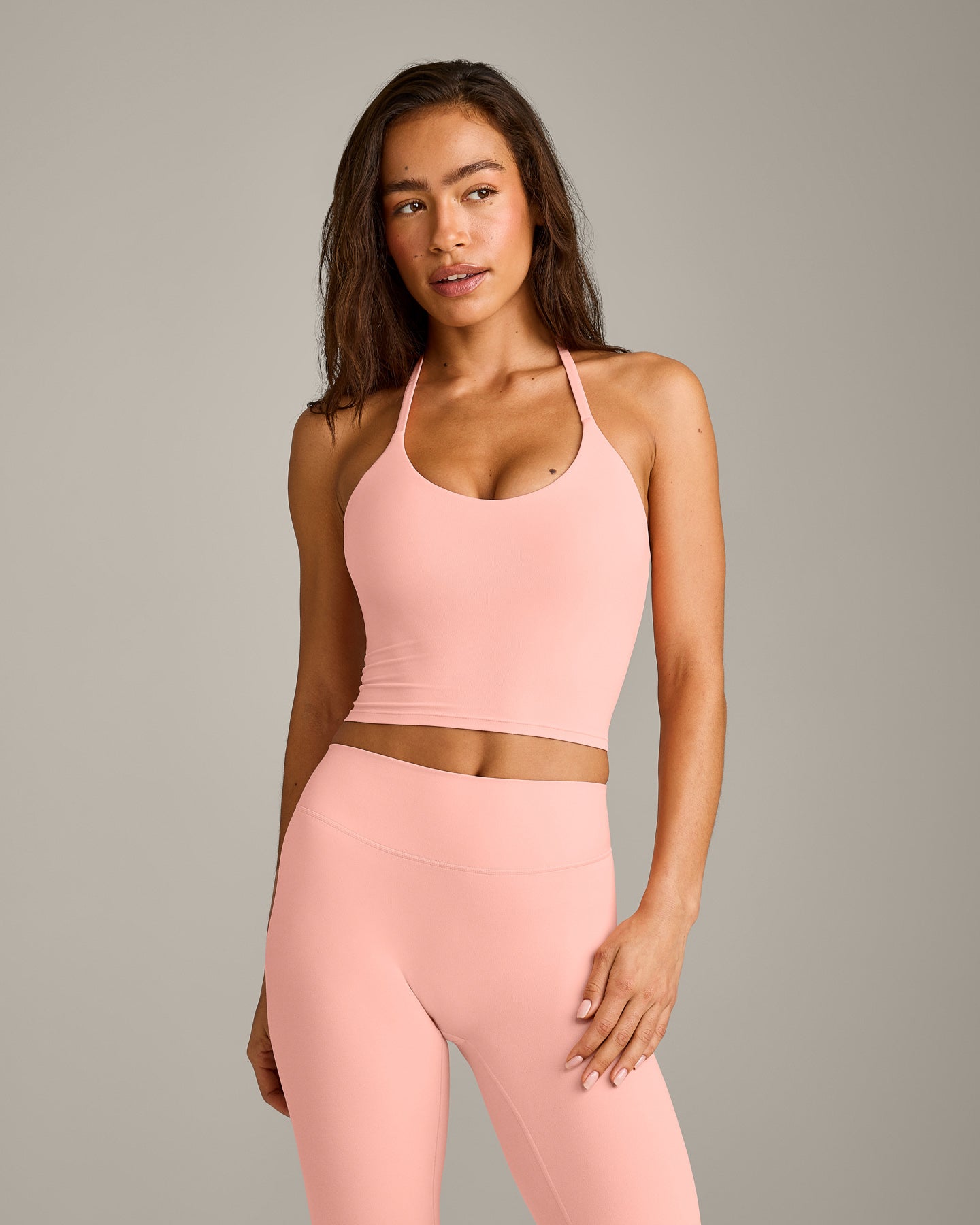 SoftMotion™ Strappy Halter Neck Mid Vest with Built in Bra Shelf with Grey Logo | Peach Orange