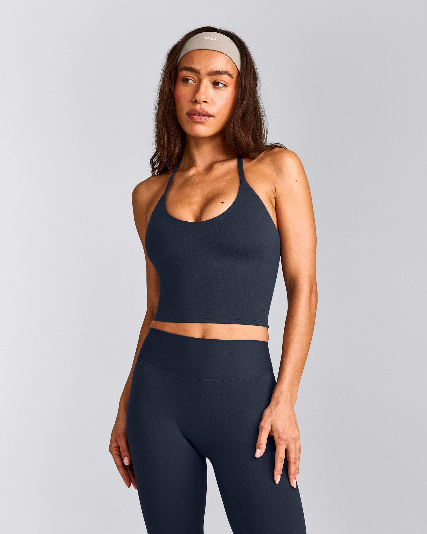 SoftMotion™ Strappy Halter Neck Mid Tank Top with Built in Bra Shelf with Grey Logo | True Blue