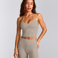 SoftMotion™ Strappy Halter Neck Mid Tank Top with Built in Bra Shelf with White Logo | Warm Sand