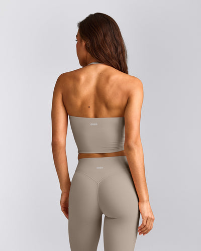 SoftMotion™ Strappy Halter Neck Mid Tank Top with Built in Bra Shelf with White Logo | Warm Sand