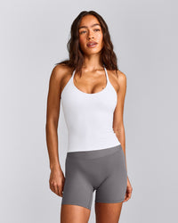 SoftMotion™ Strappy Halter Neck Tank Top with Built in Bra Shelf with Grey Logo | White