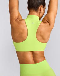 EasyLift™ Zip High Neck Sports Bra with Grey Logo | Citrus Green