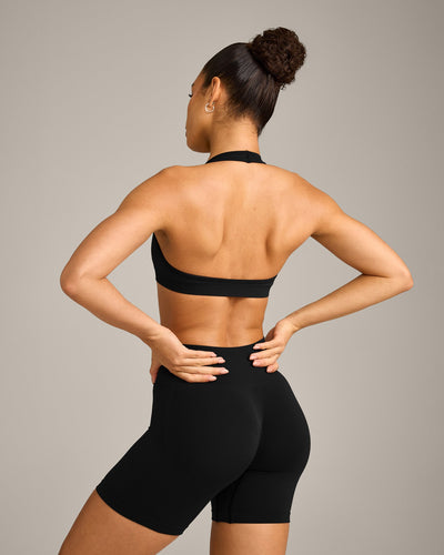 EffortlessLift™ Seamless Halter Neck Sports Bra with Grey Logo | Black