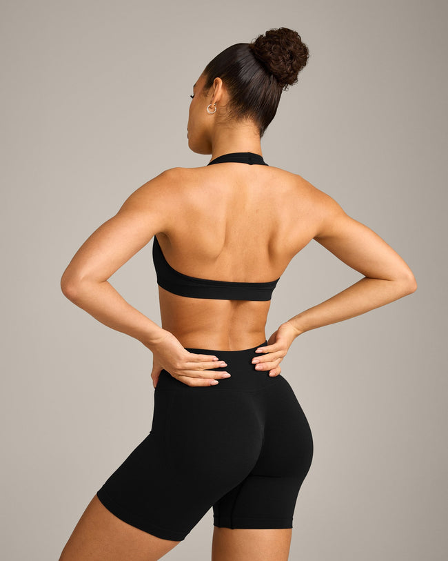 EffortlessLift™ Seamless Halter Neck Sports Bra with Grey Logo | Black