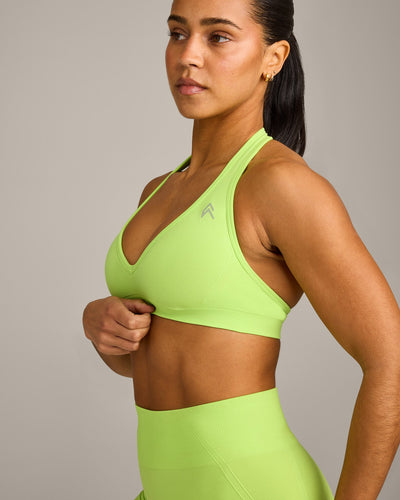 EffortlessLift™ Seamless Halter Neck Sports Bra with Grey Logo | Citrus Green