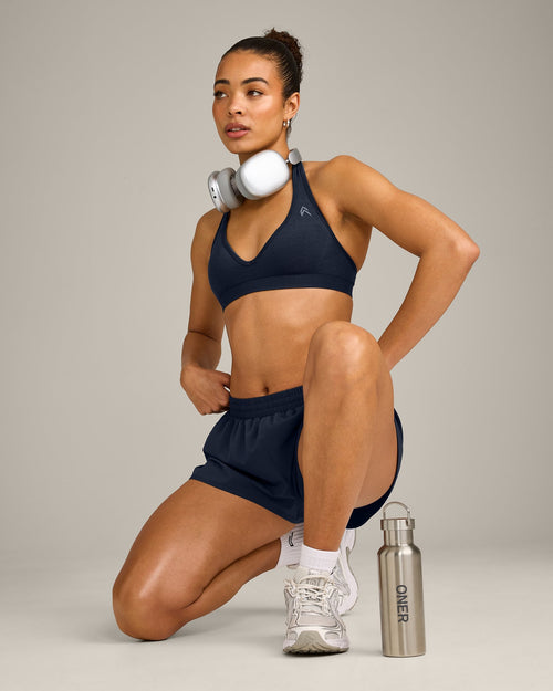 EffortlessLift™ Seamless Halter Neck Sports Bra with Grey Logo | True Blue