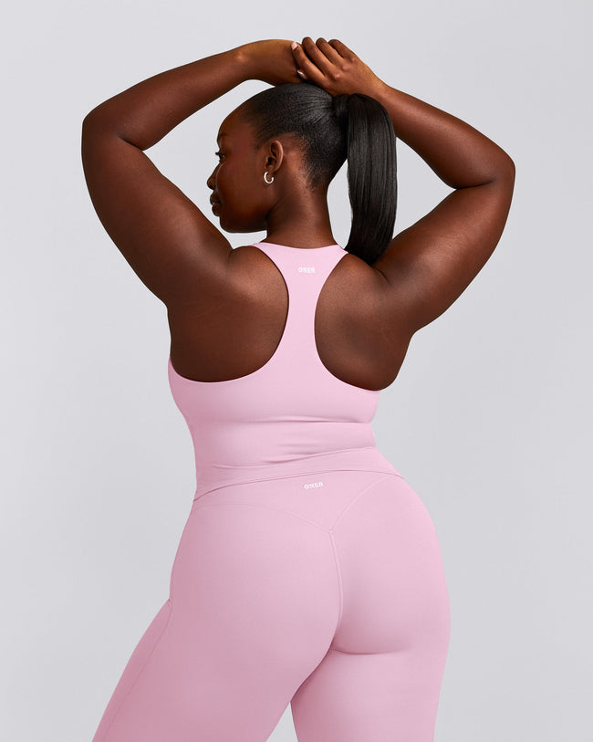 SoftMotion™ Racer Back Mid Tank Top with Built in Bra Shelf with Grey Logo | Chalk Pink