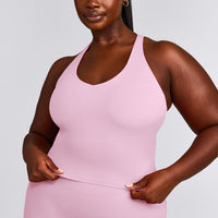 SoftMotion™ Racer Back Mid Tank Top with Built in Bra Shelf with Grey Logo | Chalk Pink