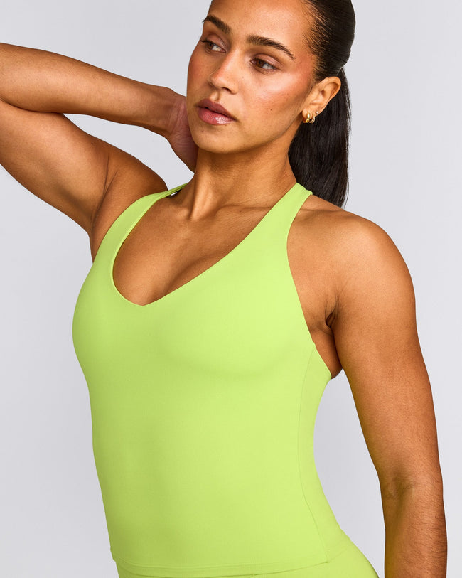 SoftMotion™ Racer Back Mid Tank Top with Built in Bra Shelf with Grey Logo | Citrus Green