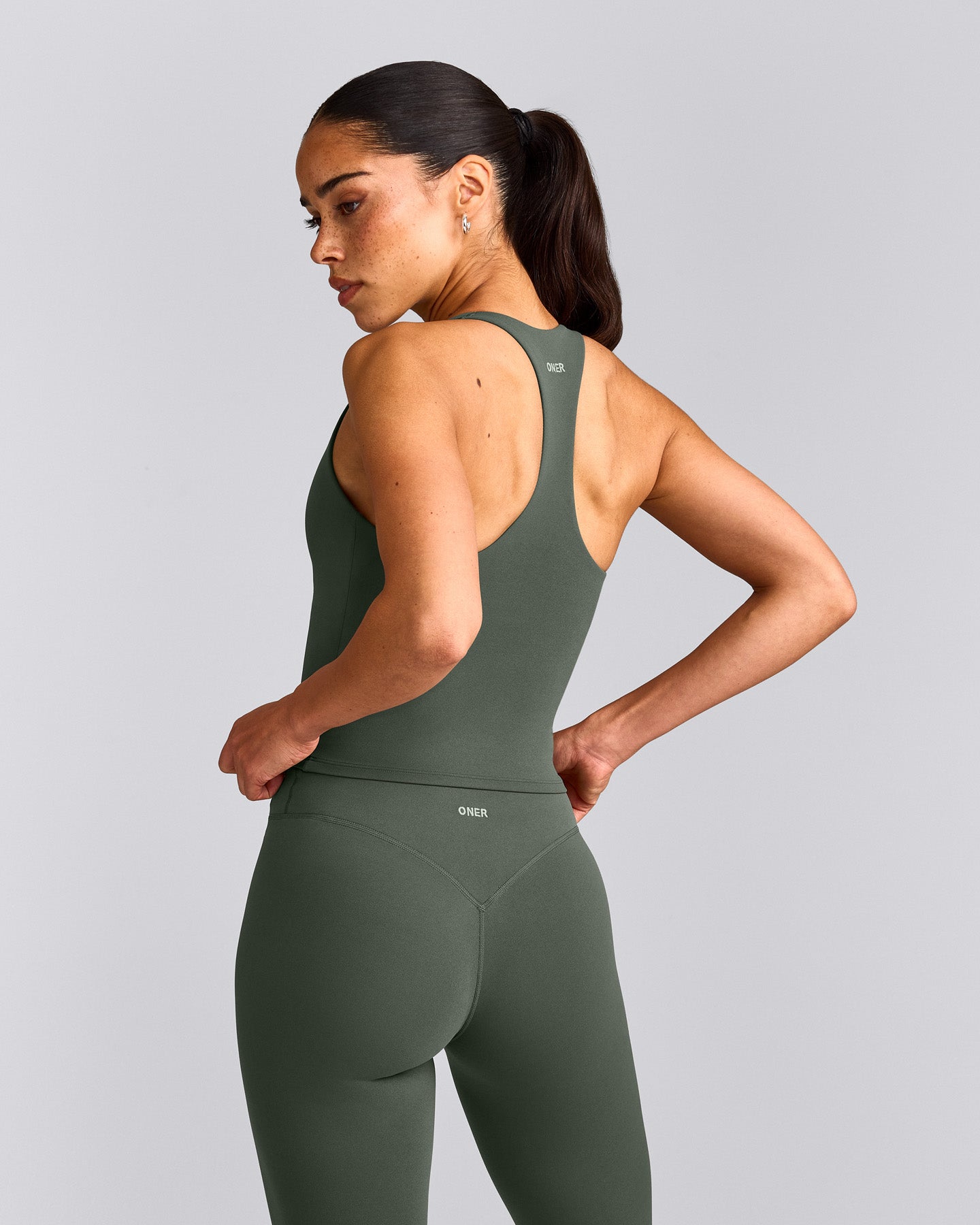 SoftMotion™ Racer Back Mid Tank Top with Built in Bra Shelf | Dark Khaki