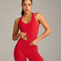 SoftMotion™ Racer Back Mid Vest with Built in Bra Shelf with Grey Logo | Fiery Red
