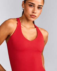 SoftMotion™ Racer Back Mid Tank Top with Built in Bra Shelf with Grey Logo | Fiery Red