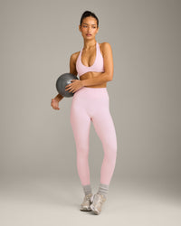 SoftMotion™ Minimal Halter Neck Bralette with Grey Logo | Soft Girl Pink