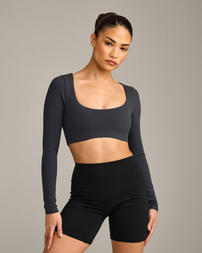 SoftMotion™ Scoop Neck Long Sleeve Crop Top with Built in Bra Shelf with Grey Logo | Coal