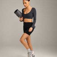 SoftMotion™ Scoop Neck Long Sleeve Crop Top with Built in Bra Shelf with Grey Logo | Coal