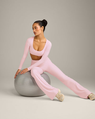 SoftMotion™ Scoop Neck Long Sleeve Crop Top with Built in Bra Shelf with Grey Logo | Soft Girl Pink