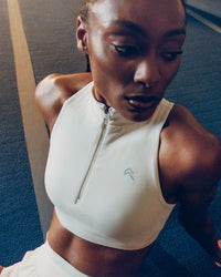 EasyLift™ Zip High Neck Sports Bra with Grey Logo | Marshmallow White