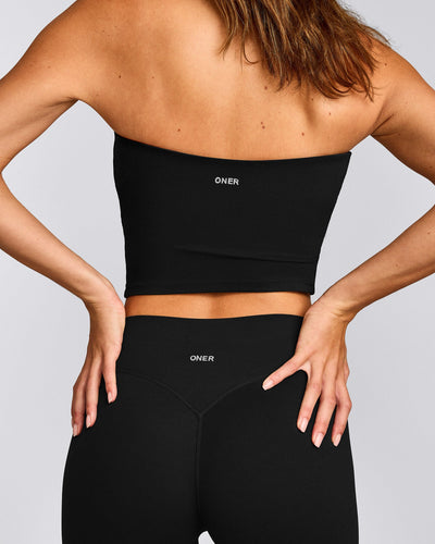 SoftMotion™ Bandeau Mid Tank Top with Built in Bra Shelf with Grey Logo | Black