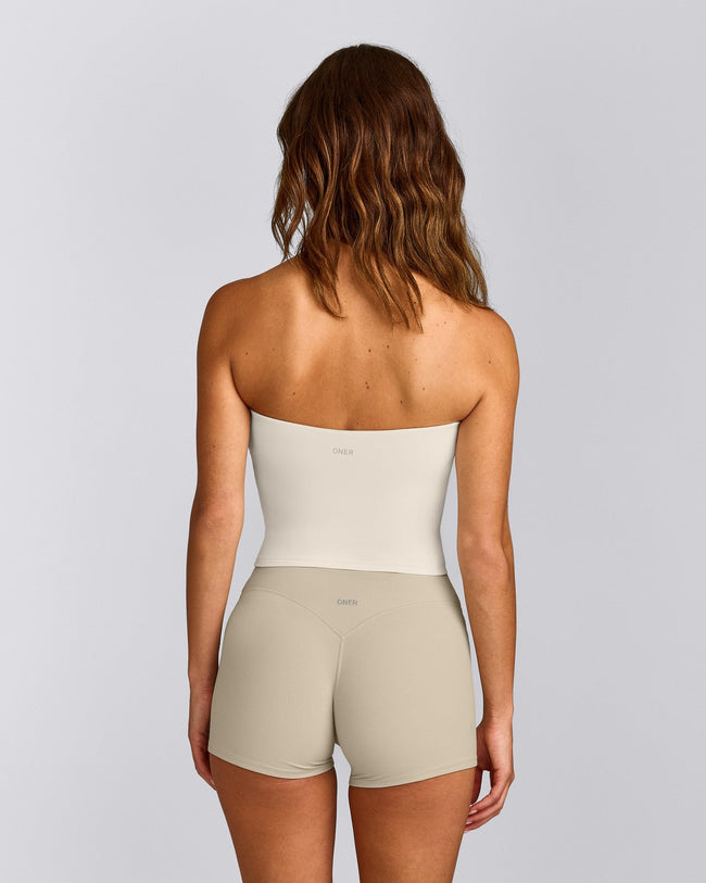 SoftMotion™ Bandeau Mid Tank Top with Built in Bra Shelf with Grey Logo | Marshmallow White