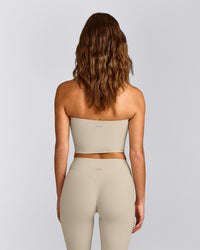SoftMotion™ Bandeau Mid Tank Top with Built in Bra Shelf with Grey Logo | Oatmeal