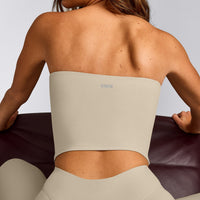 SoftMotion™ Bandeau Mid Tank Top with Built in Bra Shelf with Grey Logo | Oatmeal