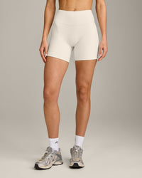 SoftMotion™ Double Layer High Waisted Shorts 6" with Grey Logo | Marshmallow White