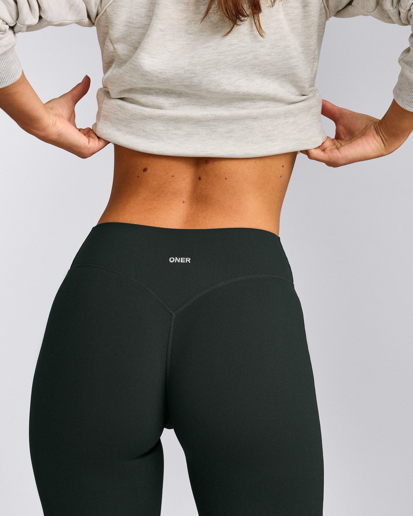 SoftMotion™ Flared Pants with Grey Logo | Emerald Noir