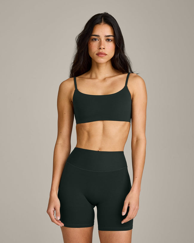 SoftMotion™ Strappy Sports Bra with Grey Logo | Emerald Noir