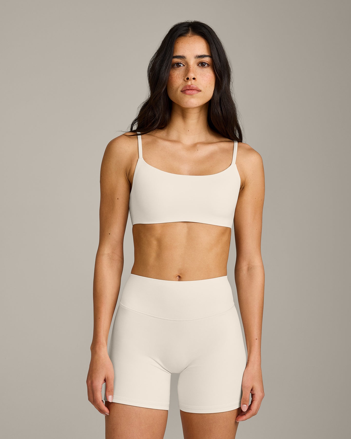 SoftMotion™ Strappy Sports Bra with Grey Logo | Marshmallow White