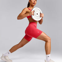 EffortlessLift™ Seamless Mid Rise Shorts with Grey Logo | Charged Pink