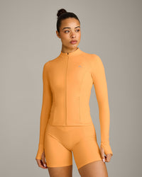 UnifiedMove™ Jacket with Reflective Logo | Powdered Orange