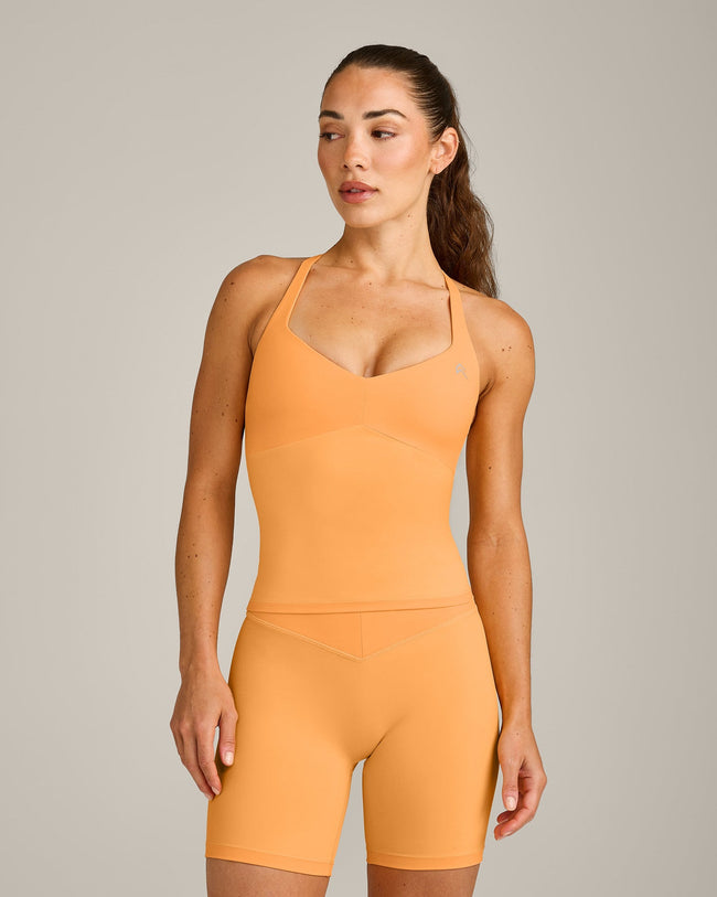 UnifiedMove™ T Back Mid Vest with Built in Bra Shelf with Reflective Logo | Powdered Orange
