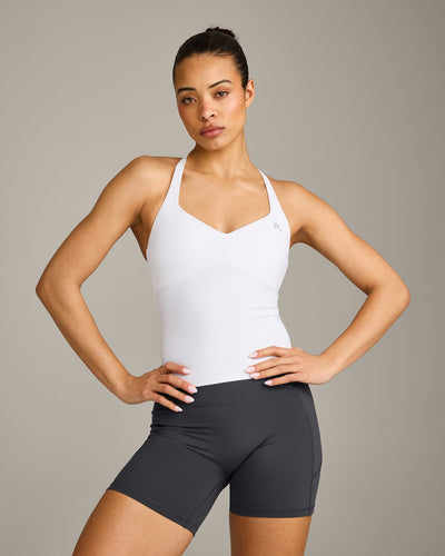UnifiedMove™ T Back Mid Vest with Built in Bra Shelf with Reflective Logo | White