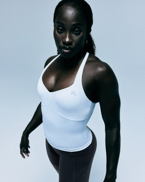 UnifiedMove™ T Back Mid Tank Top with Built in Bra Shelf | White