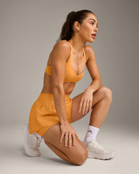 UnifiedMove™ T Back Minimal Bralette with Reflective Logo | Powdered Orange