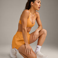 UnifiedMove™ T Back Minimal Bralette with Reflective Logo | Powdered Orange