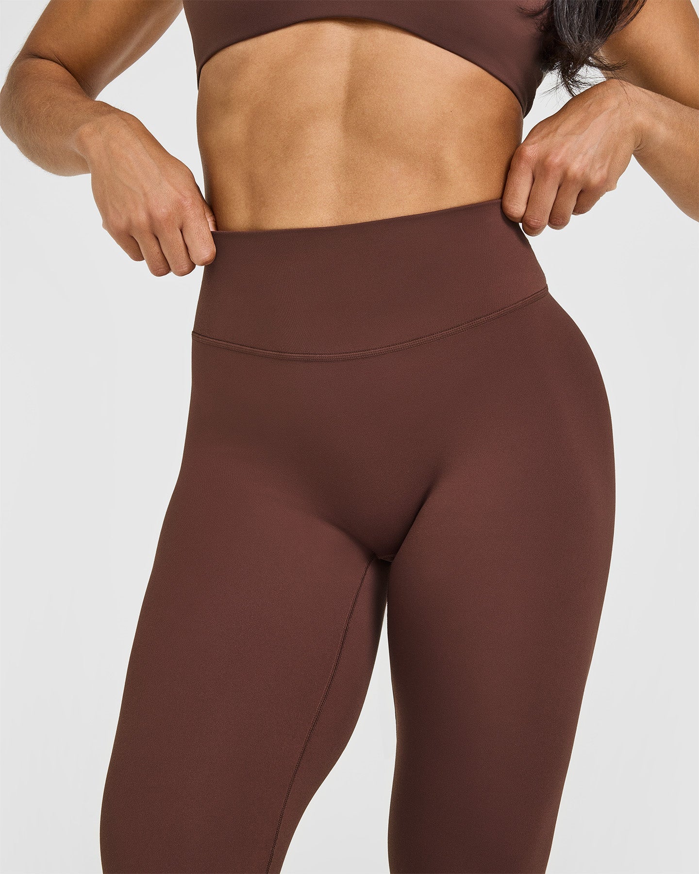 SoftMotion™ High Waisted Capri Leggings with White Logo | Espresso Brown