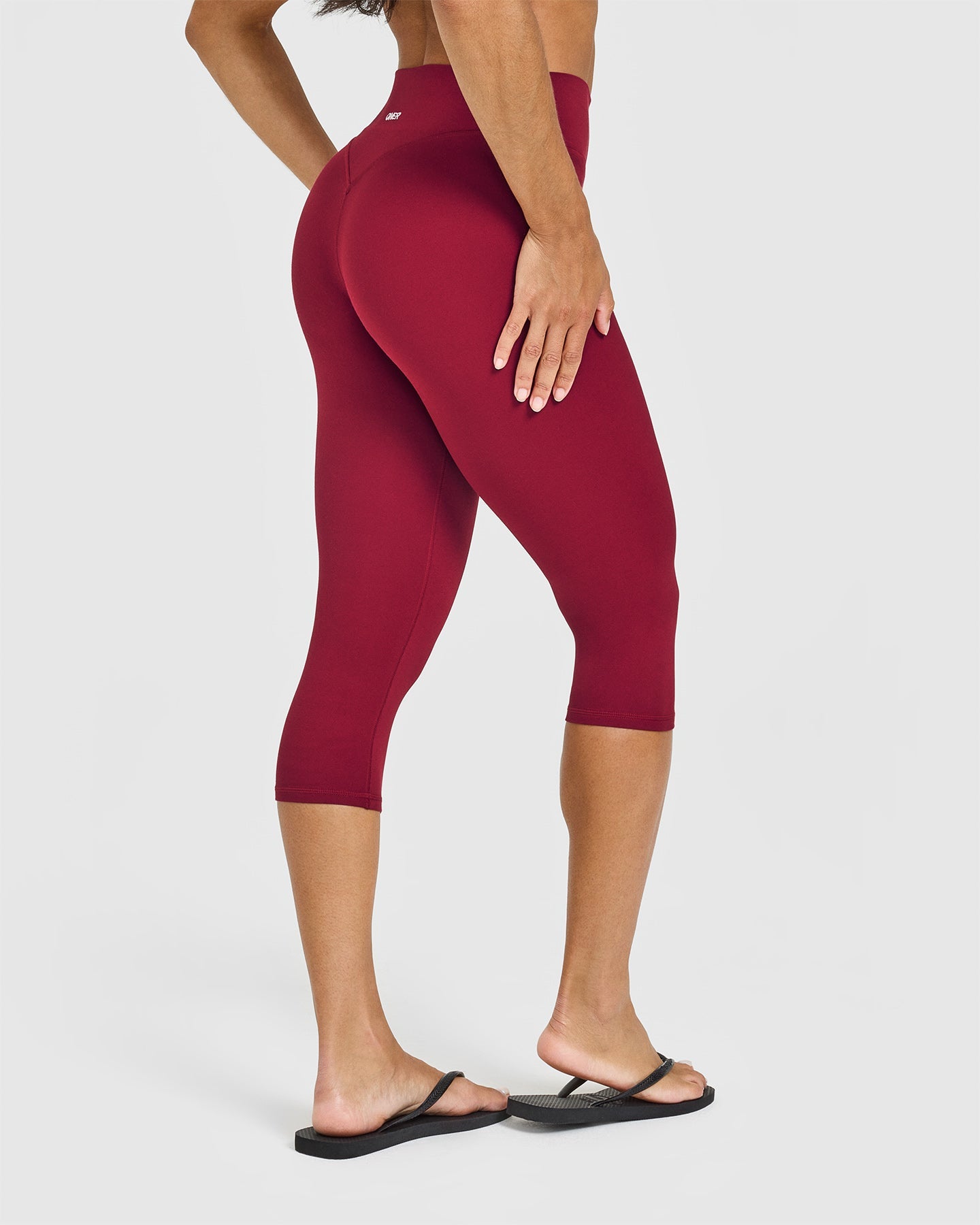 SoftMotion™ High Waisted Capri Leggings with White Logo | Ruby Red
