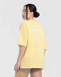 Raising The Bar Graphic Unisex T-Shirt | Sherbert Yellow