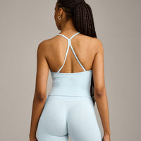 EnhanceLift™ Seamless Strappy Racer Vest with Built in Bra Shelf with Grey Logo | Cloud Blue