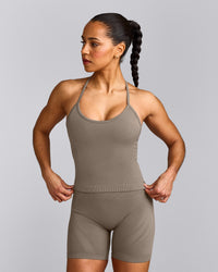 EnhanceLift™ Seamless Strappy Racer Tank Top with Built in Bra Shelf with Grey Logo | Warm Minky